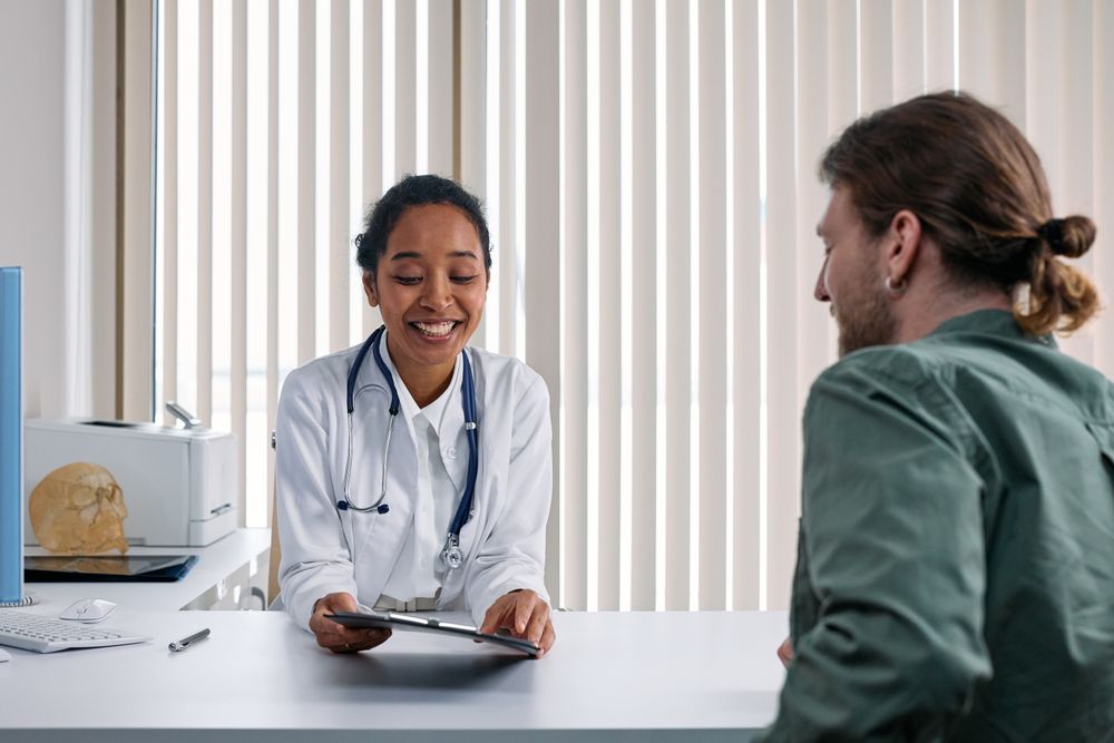A physician consulting with a patient in a private practice